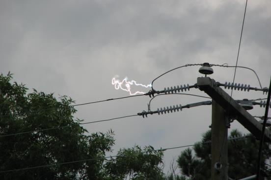 Arc of electricity between two power lines