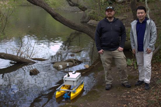 Researchers with research boat