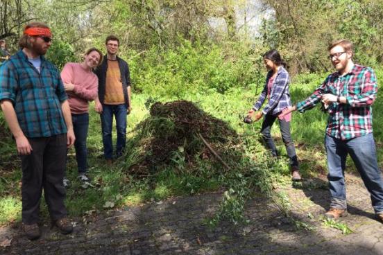Students around a pile of carbon