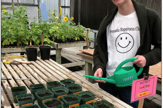 Peter Newson watering plants