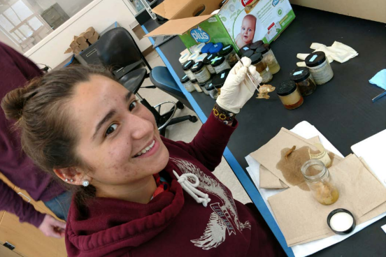 Student at lab bench identifying stomach contents