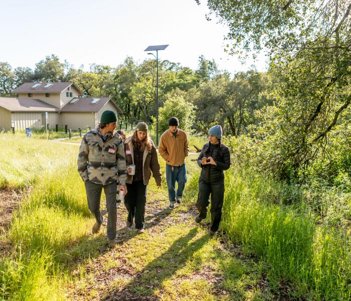 Hikers on a guided tour at Osborn Preserve