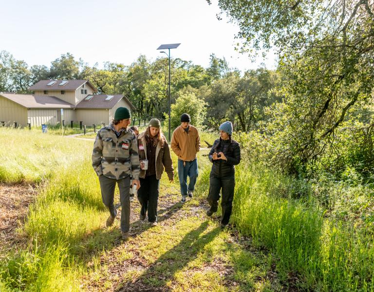 Hikers on a guided tour at Osborn Preserve