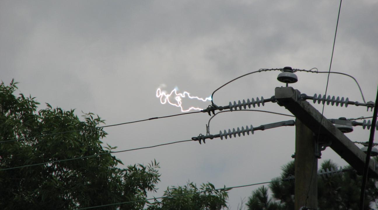 Arc of electricity between two power lines