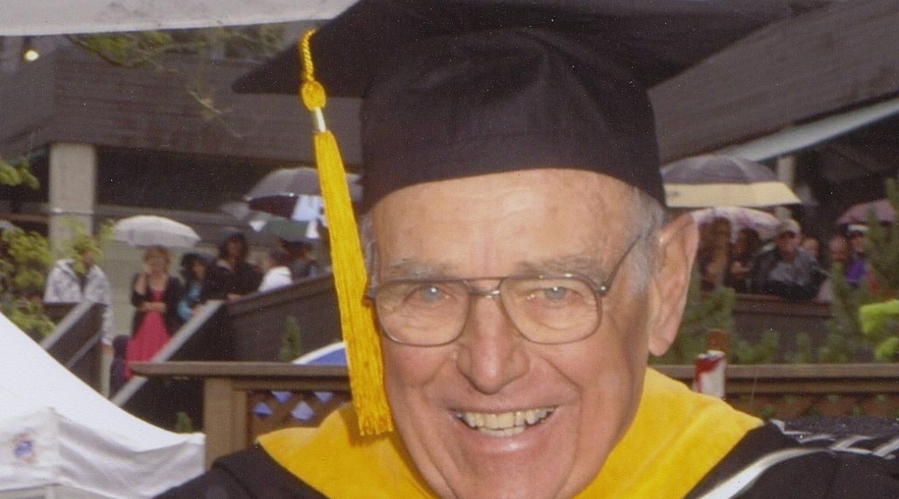 Bob Johnson in graduation robes