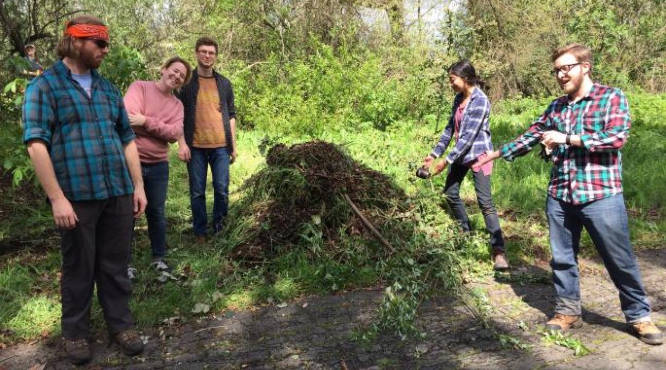 Students around a pile of carbon