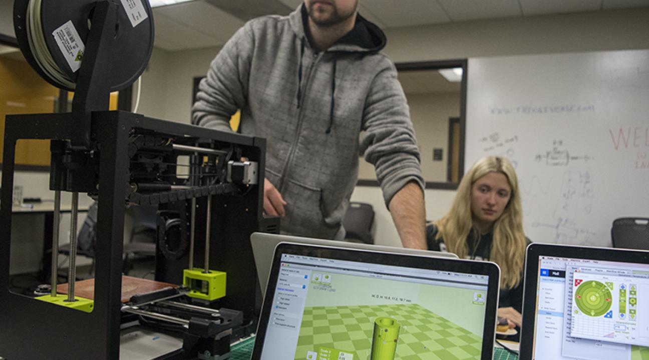 Students and computers in the SSU Makerspace