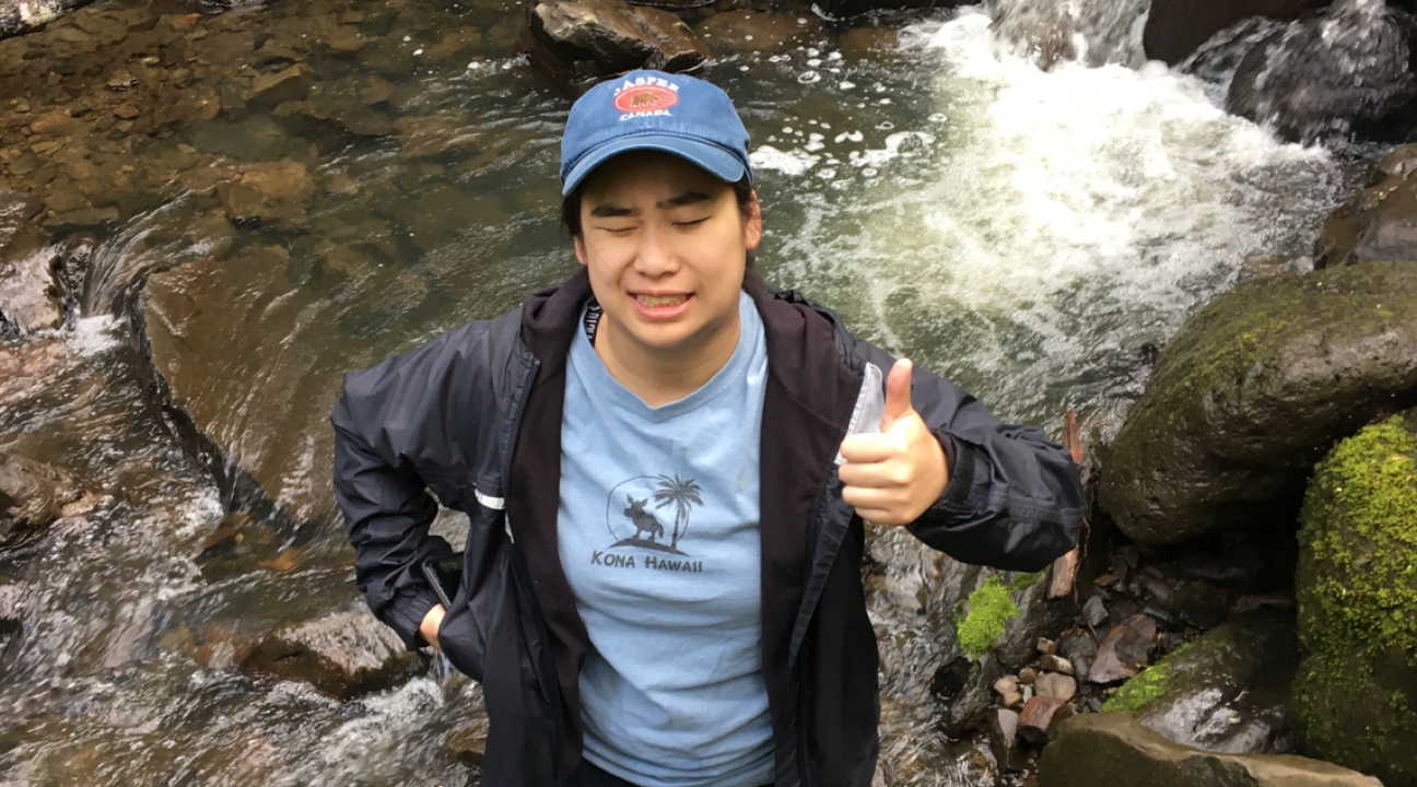 Student working in creek