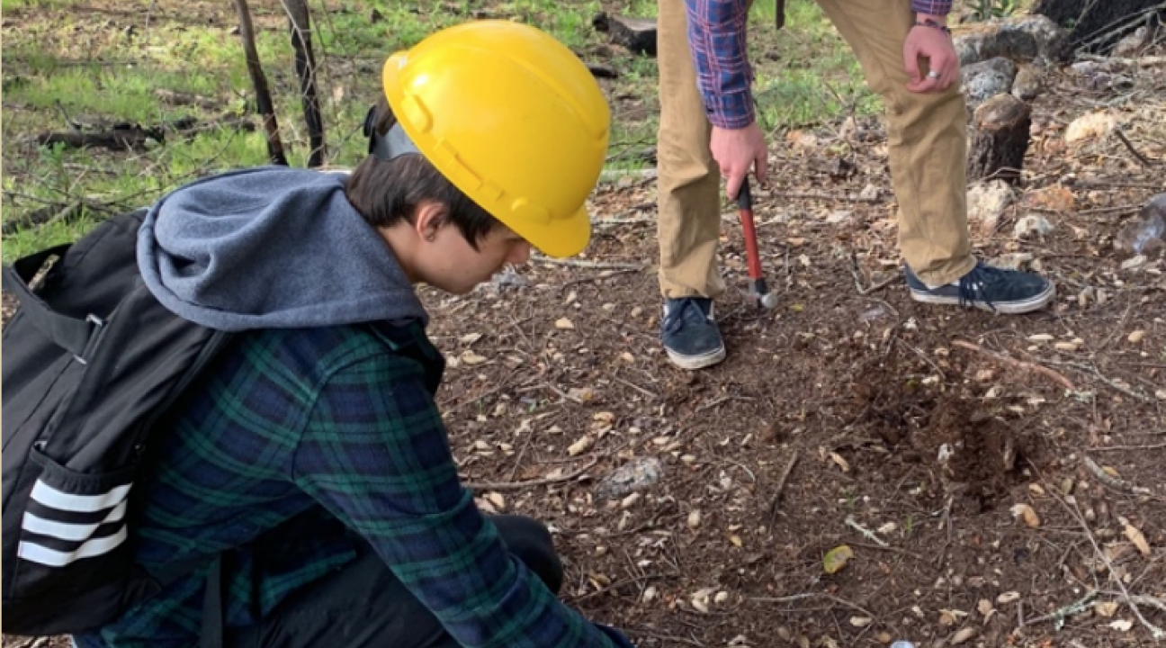 Students taking soil samples