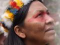 indigenous woman's face looks up