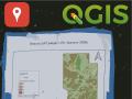 feet next to a map on soil outside with QGIS logo