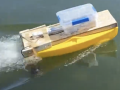 small unmanned boat on water