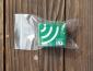 small green circuit board in plastic ziploc bag