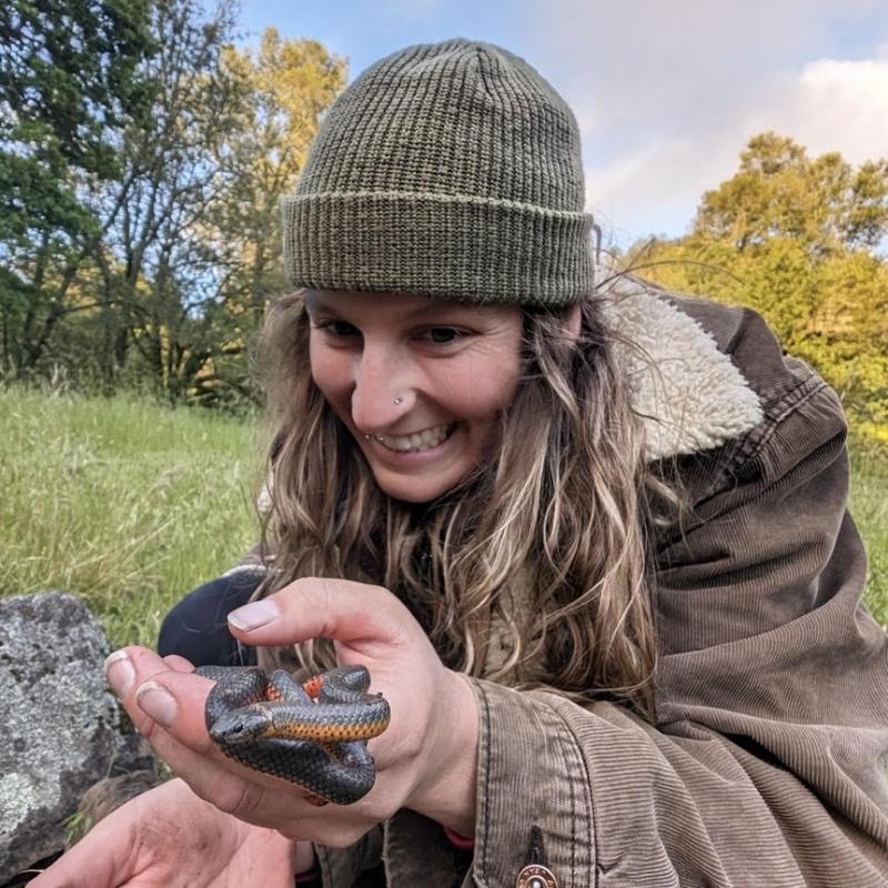 Cali Pearce checks out a snake at Osborn Preserve