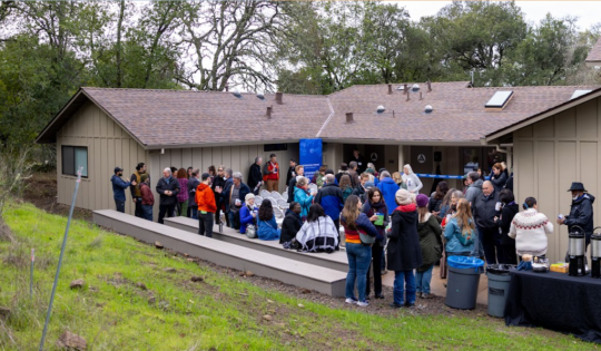 crowd of people in courtyard outside