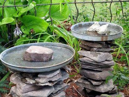 birdbaths made of plates and stones