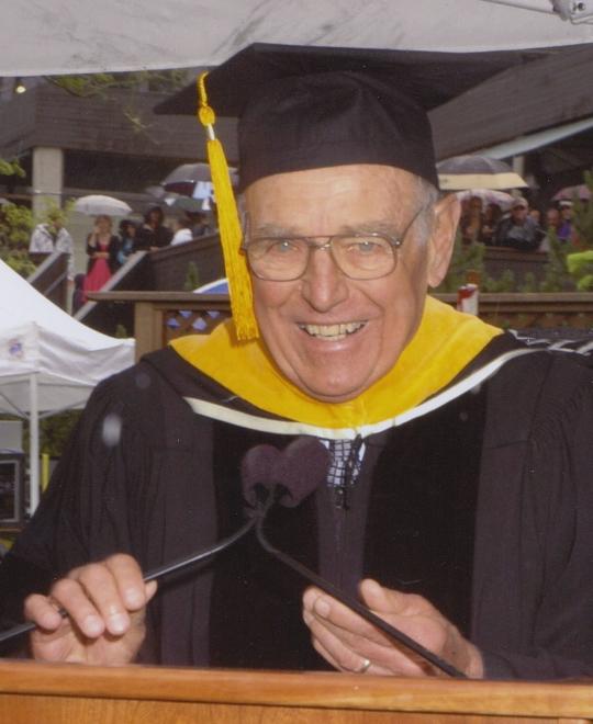 Bob Johnson in graduation robes