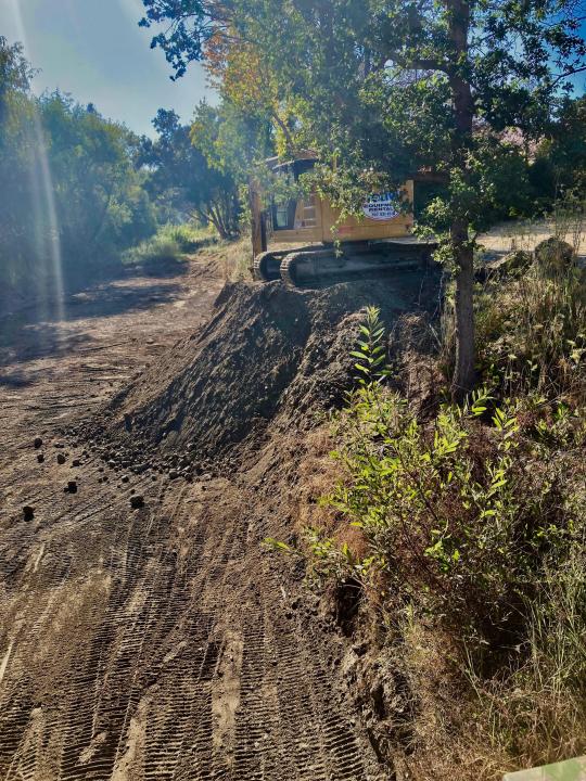 Bulldozers doing flood control along Copeland Creek in Rohnert Park