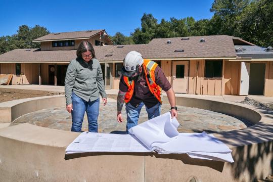 Looking at Plans at Fairfield Osborn Preserve Construction Site