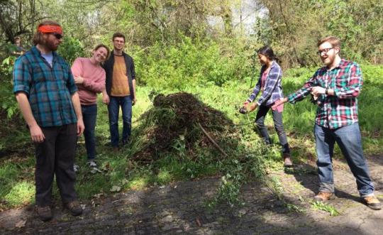 Students around a pile of carbon