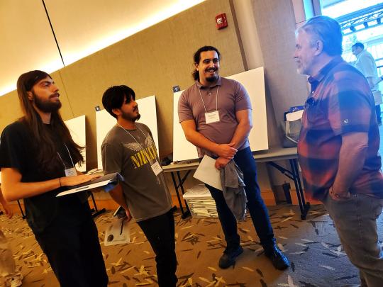 -winners chatting at 2024 SSU Research Symposium
