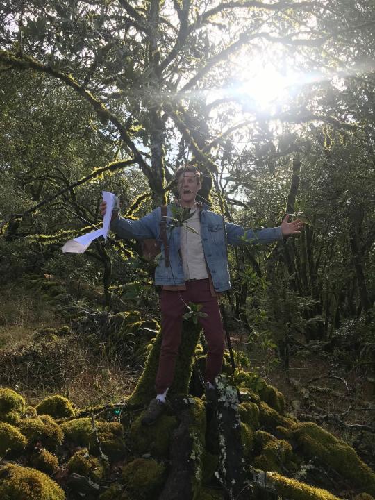 SSU researcher James Peterson stands on pile of rocks at Osborn Preserve