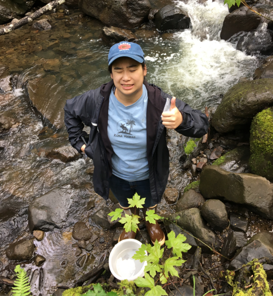 Student working in creek