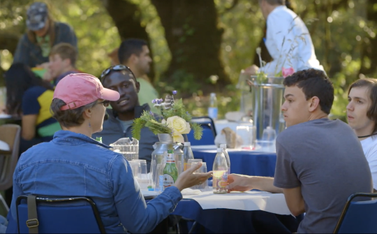 People talking at Community feast