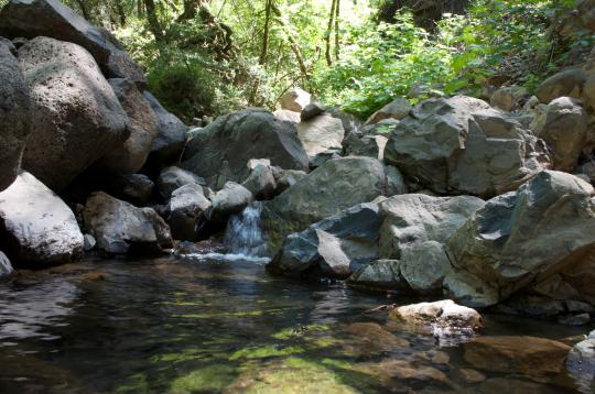 rocks at a small waterfall